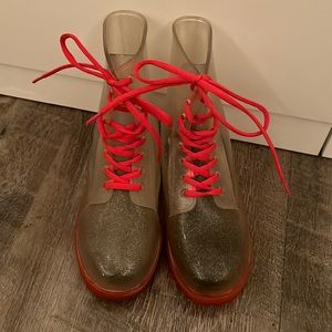 Clear/red rain boots